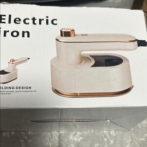 Compact Beige Electric Iron with Gold Trim